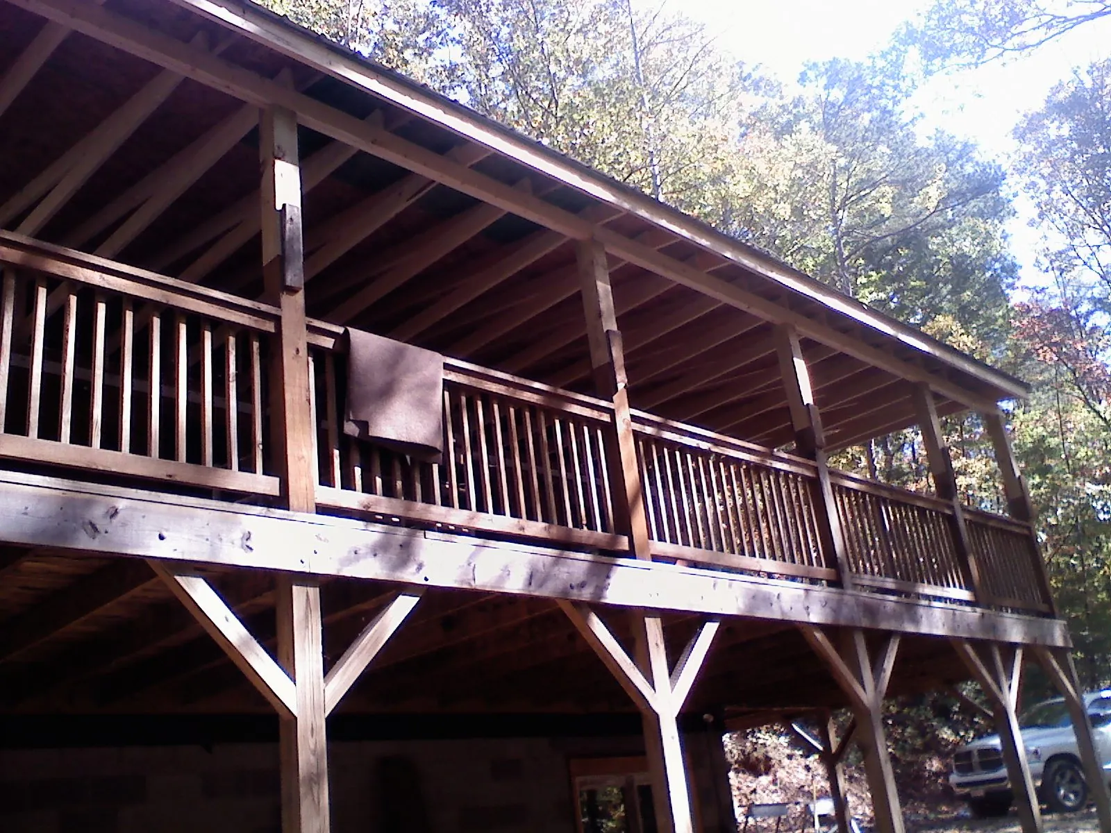 Timber framing under a new elevated porch and deck — Roof Leak Repair in Kendallville by Roofing Brothers